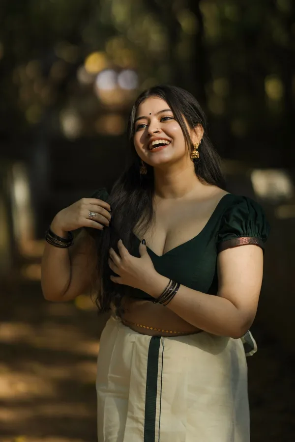 Gopika Keerthy Stuns in Forest Green Puff-Sleeve Blouse and Saree