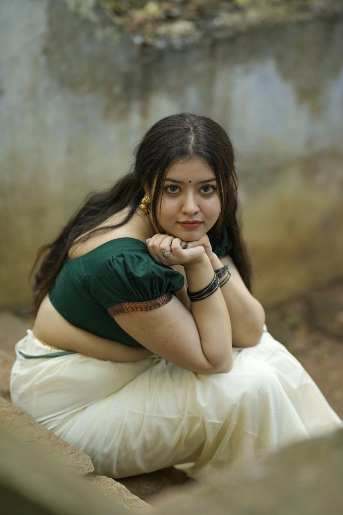 Gopika Keerthy Styles Kerala Saree with Black Bangles and Nose Pin