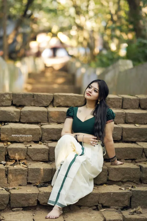 Gopika Keerthy in Signature Kerala Style: Saree, Jhumkas, and Free Hair