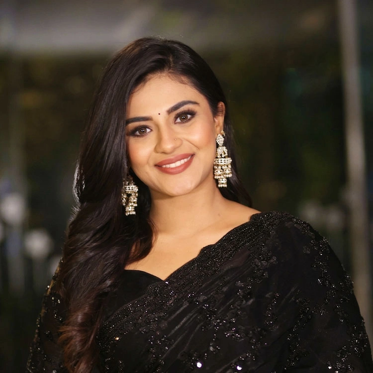 Nayan Sarika in Black Sequin Embroidered Saree at Rakasa Movie Pre Release