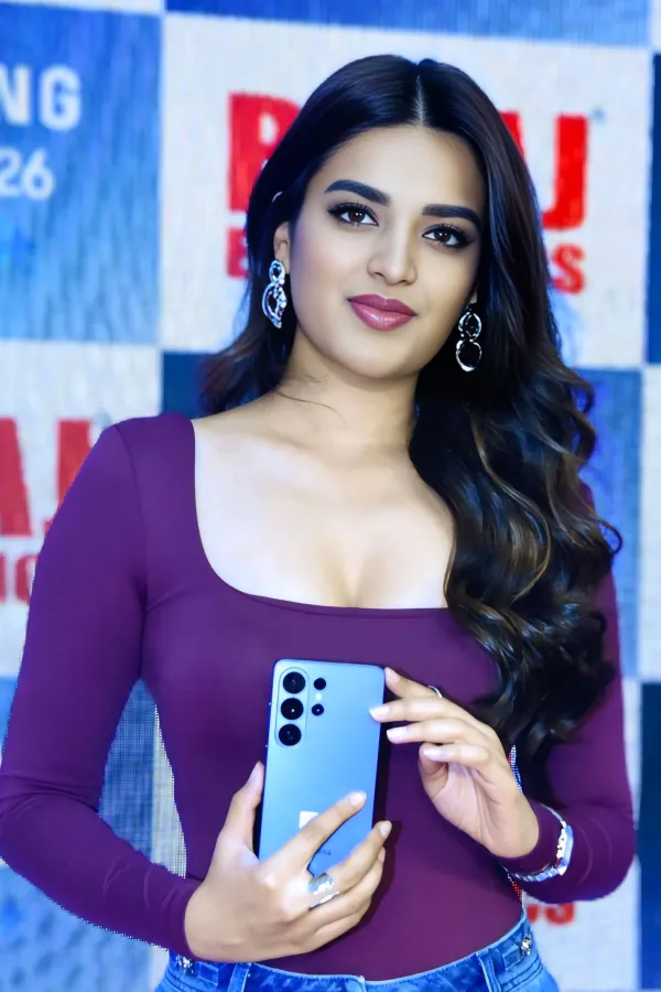 Nidhhi Agerwal Stills: Plum Bodysuit at Samsung Galaxy S26 Launch