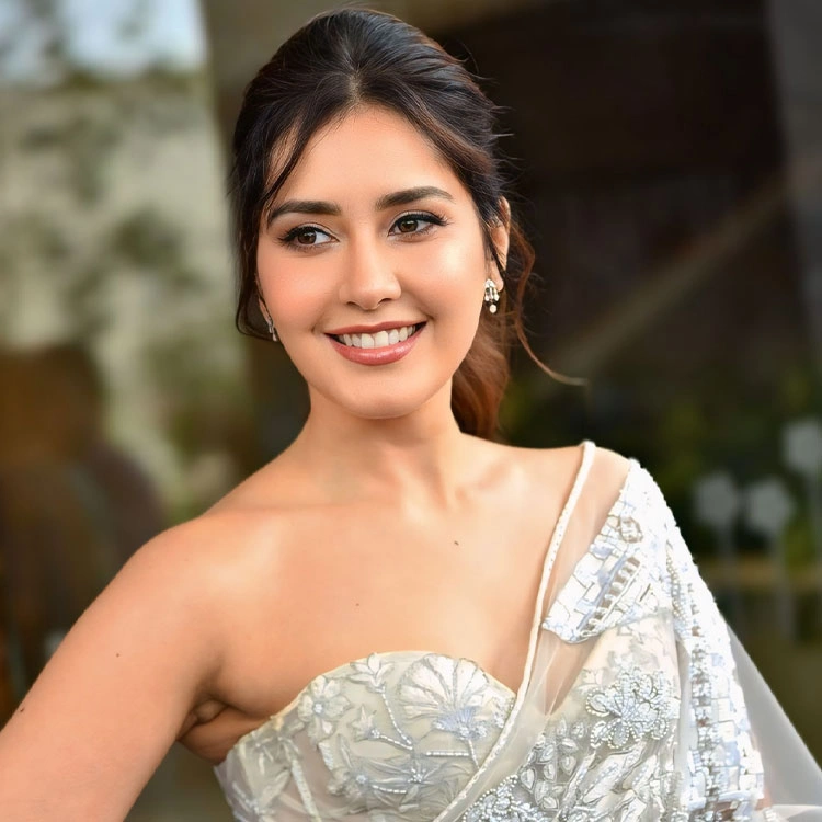 Raashi Khanna in White Embroidered Net Saree at Ustaad Bhagat Singh Release Press Meet