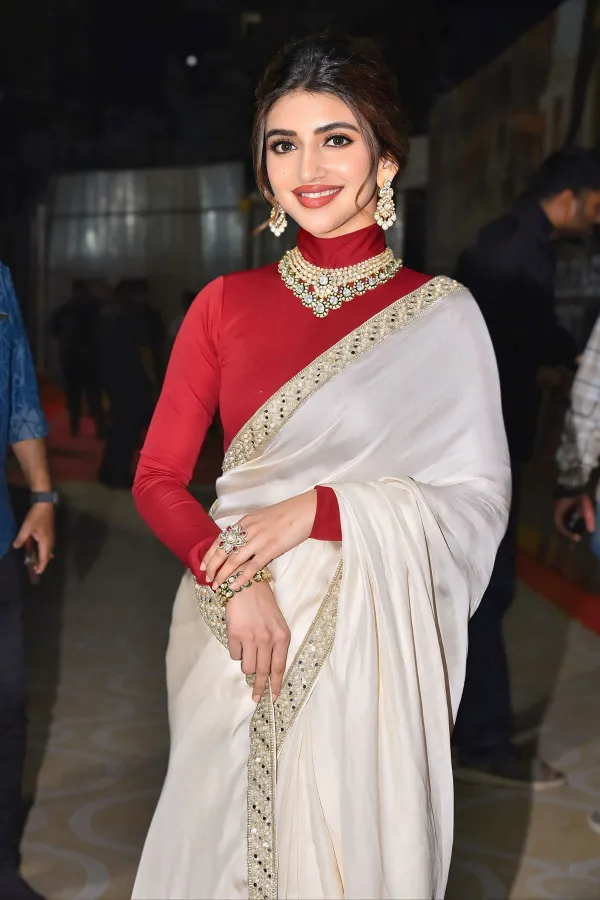 Sreeleela Stills | Ivory Silk Saree With Embellished Border & Bold Maroon Blouse