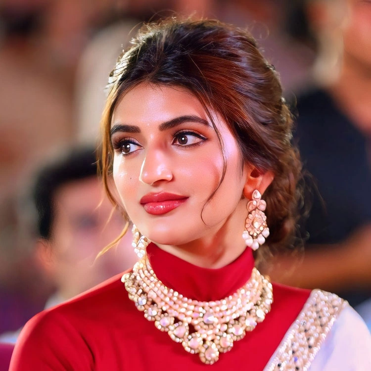 Sreeleela stills in Ivory White Saree at Ustaad Bhagat Singh Pre Release Event 