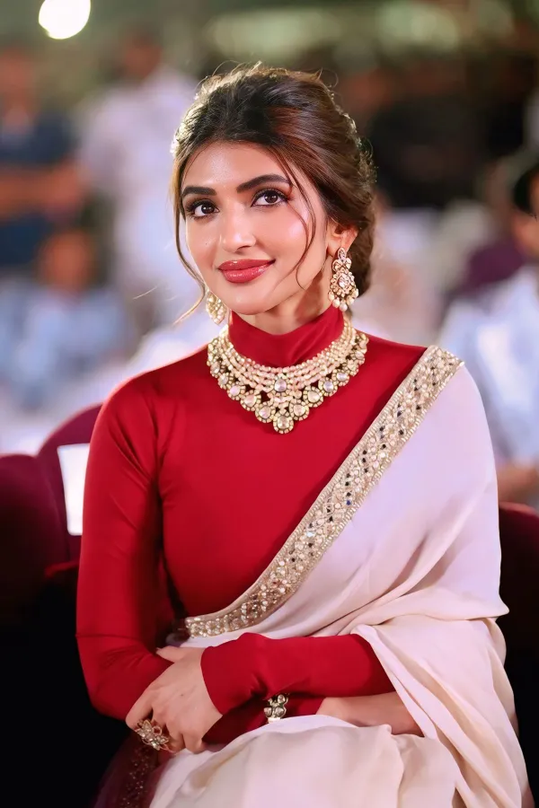 Sreeleela in Iconic Ivory Saree With Maroon Turtleneck Blouse at Ustaad Bhagat Singh Event