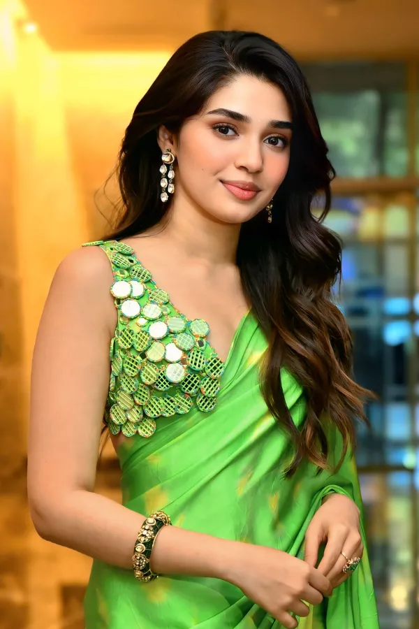 Krithi Shetty Radiates in Lime Green Satin Silk Saree
