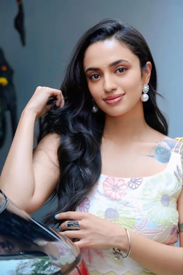 Malavika Nair Radiates Charm in Lemon Organza Lehenga Suit