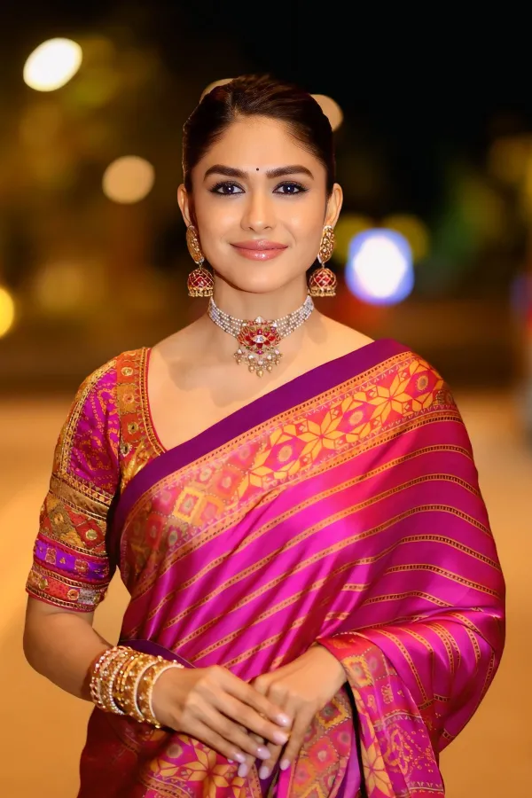 Mrunal Thakur Stills in Magenta Silk Saree | Dacoit Pre-Release Event